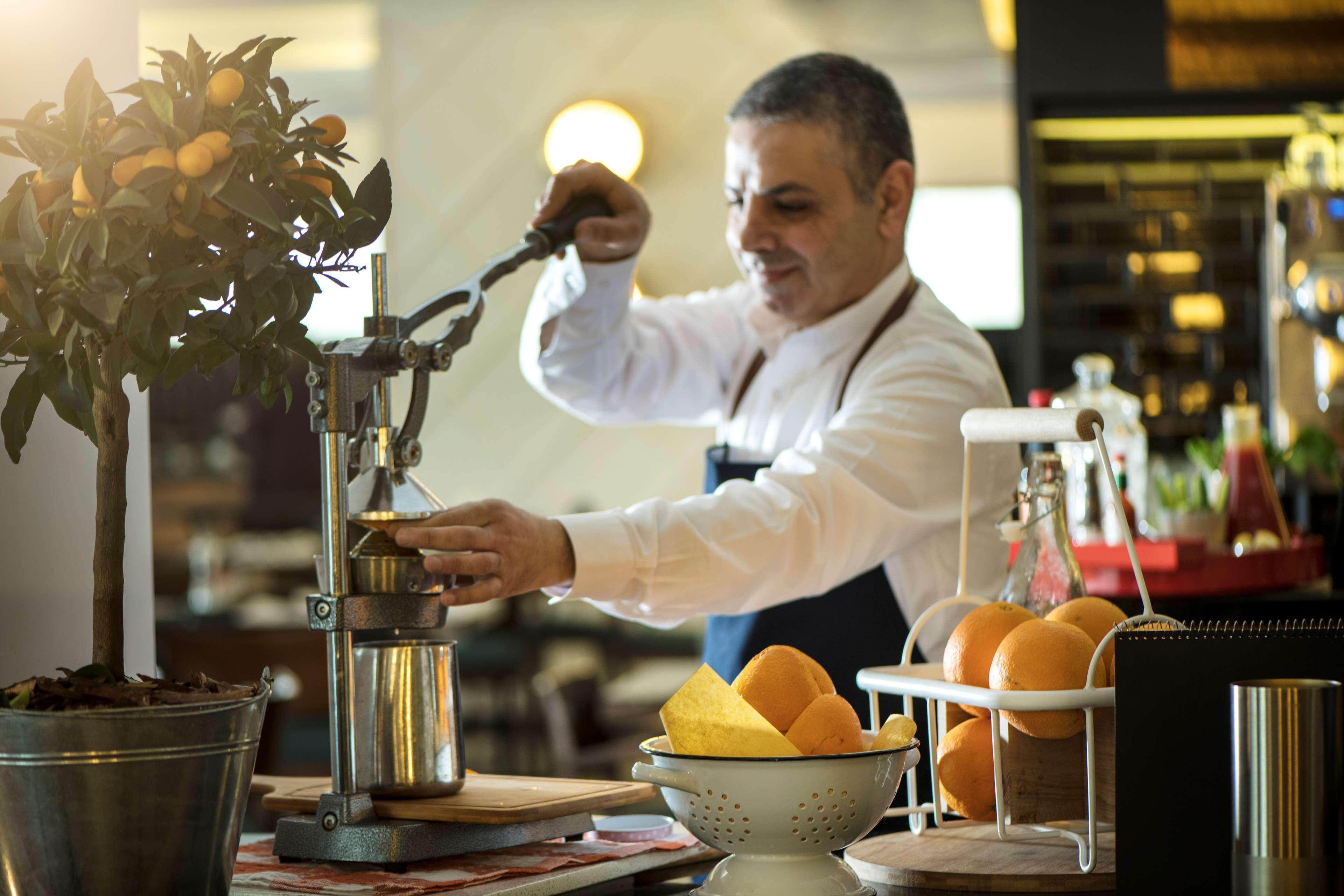 Radisson Blu Hotel, Beirut Verdun Exteriér fotografie A bartender at work